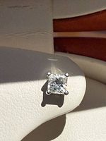 Front view of princess-cut diamond in 14K white gold setting