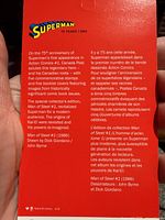 Back cover of booklet with bilingual Superman 75 Years text