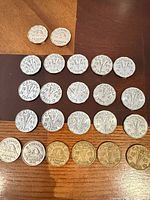 Overview of 23 Canadian 5-cent coins showing both Victory and Beaver designs