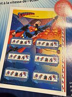 Front view of Superman 75th uncut press sheet showing six souvenir panes