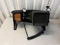 Front view of HPI Dual Eight 8mm film editor showing screen, reel arm and power cord