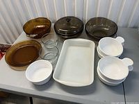 Group shot of all vintage glass and ceramic pieces on table