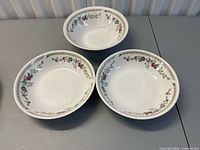 Top view of three matching floral bowls