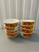 Stacked view showing all eight sunflower bowls