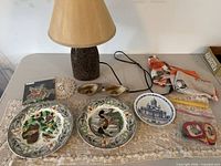 overview of lamp, plates, Frankoma oil lamps, textile and misc