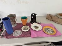 Group shot of all pottery pieces on table