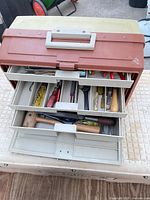 Overall view of Plano tackle box open displaying contents