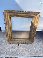 Full view of rectangular ornate gold wooden frame
