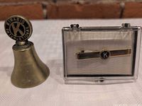 Bell and display box with tie bar