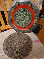 Framed plaque and loose plaque front view