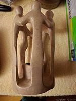 Side view of stone figurative tealight holder