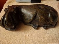 Top and side view of carved soapstone hippopotamus