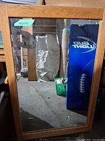 Front view of rectangular oak framed mirror