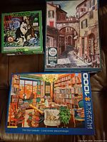 Front view of all three puzzle boxes