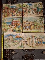Fronts of all six placemats arranged to show different Caribbean scenes