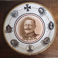 Front of plate showing portraits, Iron Cross and gold rim