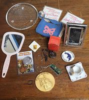 Overall view of assorted small items on table