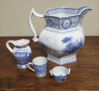 All four porcelain pieces grouped together