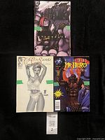 Three representative comics: Khaos Eyes, Top Cow Secrets, Mr. Hero
