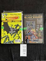 Batman Incorporated Leviathan Strikes! and The League of Extraordinary Gentlemen Black Dossier bagged together