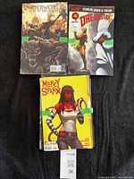 Three comics laid out: Underworld, Dreadstar, visible stack of others