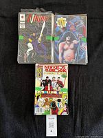 Front view showing Ninjak, Tazz, New Kids on the Block