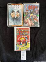 Front view showing three representative comics (Madumi, Gen13, Richie Rich & Jackie Jokers)