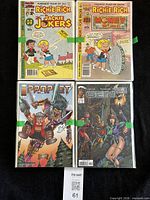 Front view of four representative comics (Richie Rich & Jackie Jokers, Richie Rich Money World, Prophet, Gen13)
