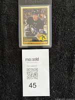 Card in sleeve with lot number slip