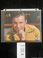 Full view of signed 8x10 photo in sleeve