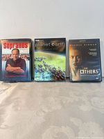 Three DVD cases front view