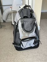 Three-quarter front view highlighting pockets and staining