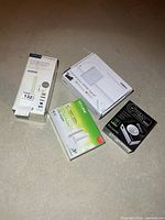 Group shot of all four boxed items on floor