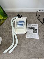 Entire lot showing lifter bars, slide pads in plastic tub, instruction sheet