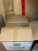 Closed shipping box with Fusion Breath Model 250 label
