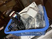 Basket showing multiple audio cables, packaged and loose