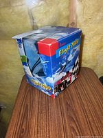 Box front angle showing Genius Flight 2000 branding