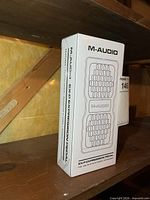 Front view of sealed retail box showing brand and product graphic