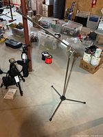 Full view of chrome microphone stand with boom arm extended