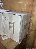 Two cardboard boxes of flexible duct pipe, labels visible