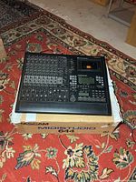 Full view of Tascam Midistudio 644 unit resting on original box