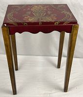 Full view of table showing hand-painted top and legs