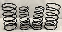 Front view of all four Eibach springs showing height and condition