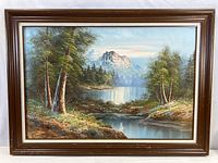 Full view of framed mountain landscape painting