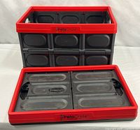 One crate open, one crate folded flat showing red rim and InstaCrate logo.