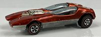Side view of metallic red Splittin’ Image car showing body, wheels, paint