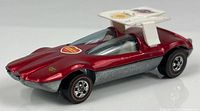 Left front side view of Swingin’ Wing showing rose paint, redline wheels, white wing