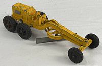 Overall view of yellow die-cast Hubley six-wheel road grader