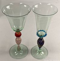 Full view of both Murano goblets showing overall design and height