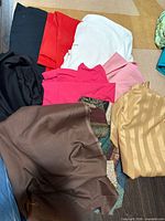 All fabric pieces laid out showing colours and textures